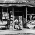 McHugh’s Bazaar at 206 Bridge Street, once Shawley’s. It was typical of a small general merchandise store of the early 20th century—Panama Coaster wagons, postcards, tin washtubs, and baseball bats. In the window at left, on top, is The Charlie Chaplin Walk sheet music. After a 1924 New Year’s Eve fire, Mr. McHugh accused the firemen of pilfering half his stock, but the police chief could discover no wrongdoing. McHugh’s Bazaar