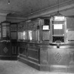 Typical of the age, ornate glass, brass and wood tellers’ cages dominated the Charlevoix County Bank. Charlevoix County Bank